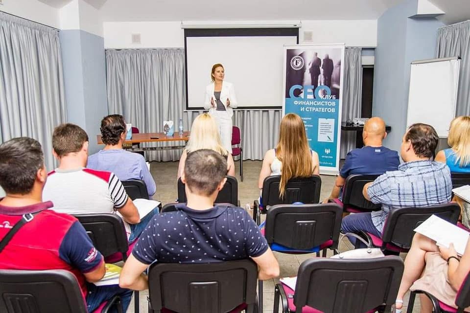 Viktoriia presenting to a business audience